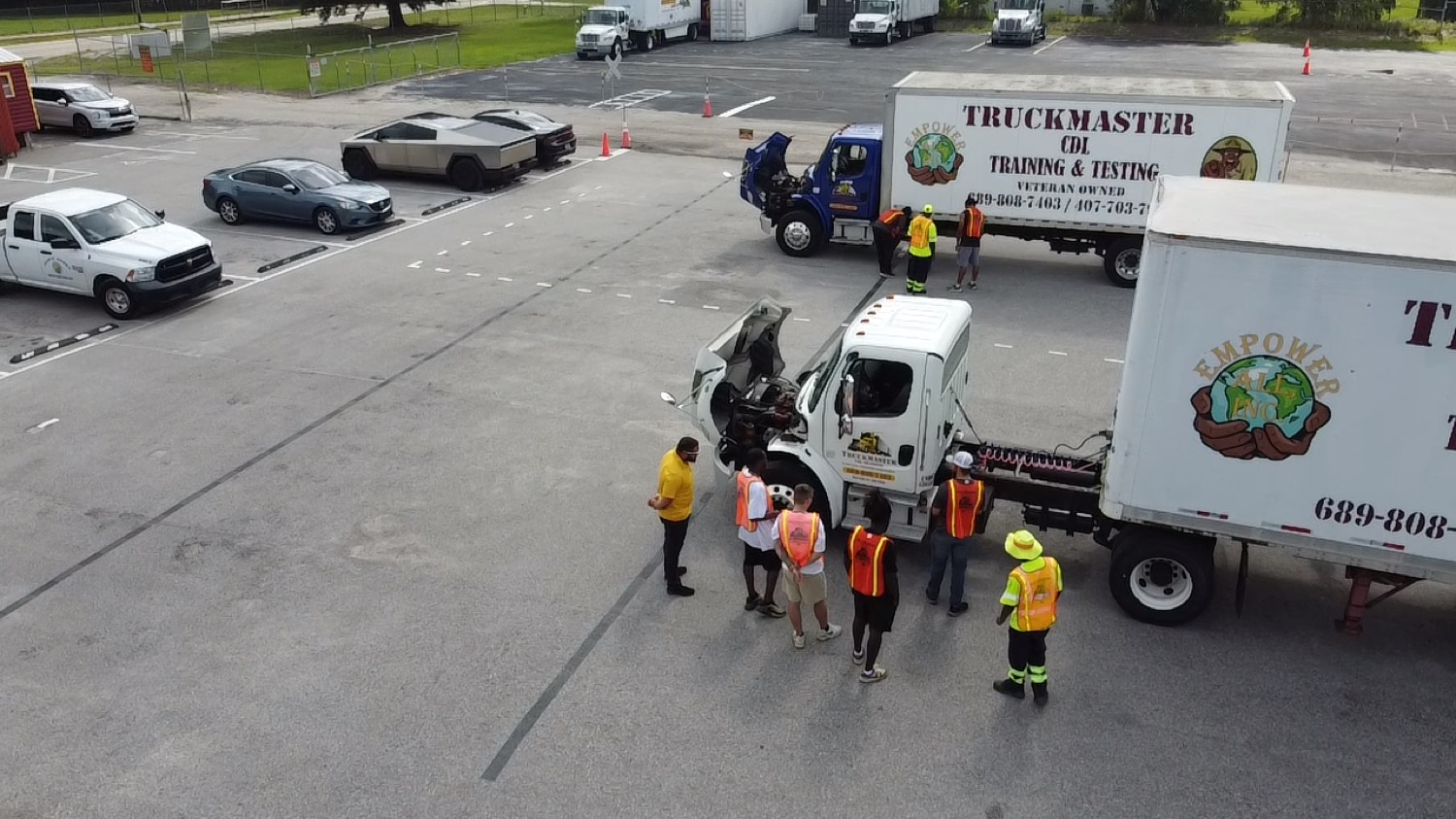 Byron Simpson teaching a group of CDL students a pre-trip inspection at the TruckMaster training yard in Apopka, FL