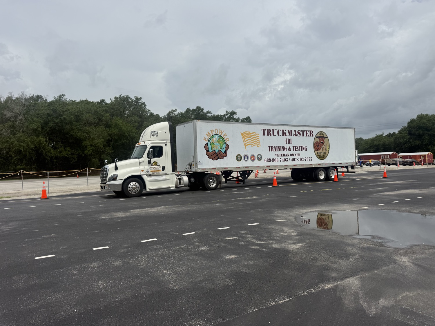 TruckMaster CDL Training & Testing veteran-owned tractor-trailer on the training pad in Apopka, FL